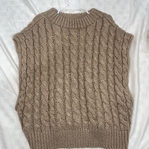 Brownish or tan vest